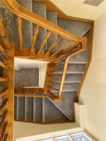Stairs leading to pool room