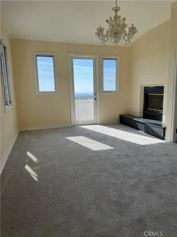 Master sitting room with fireplace