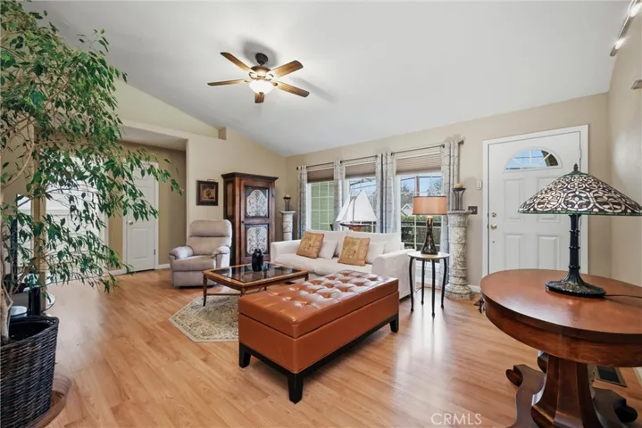 Bright and airy living area with vaulted ceiling.
