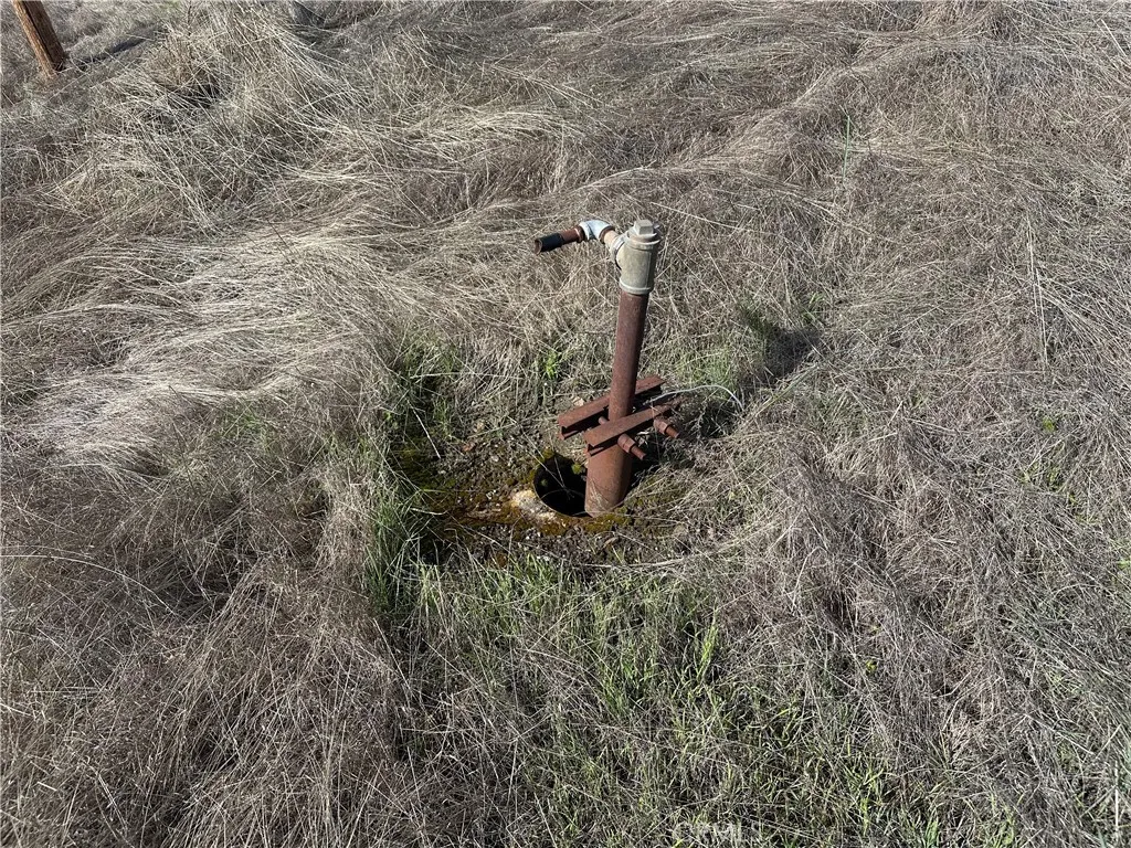 Old well at north end of property. There are 4 well casings that appear to have been used when mining was being done.