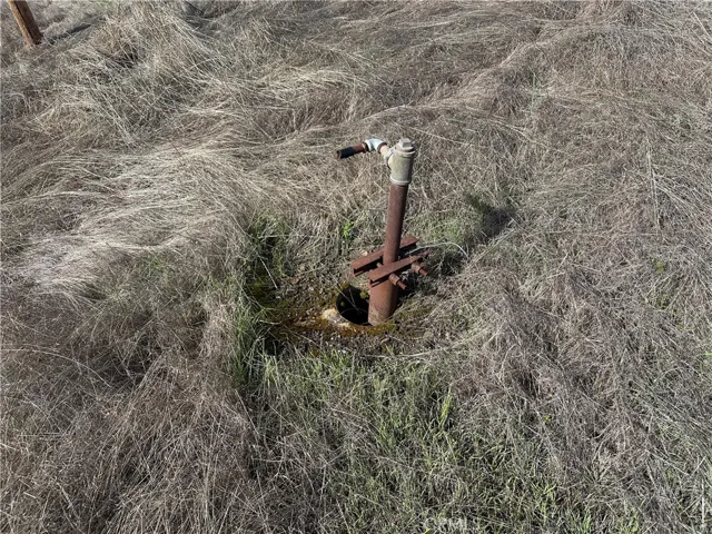 Old well at north end of property. There are 4 well casings that appear to have been used when mining was being done.