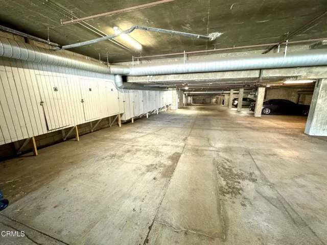 Secured parking garage with storage