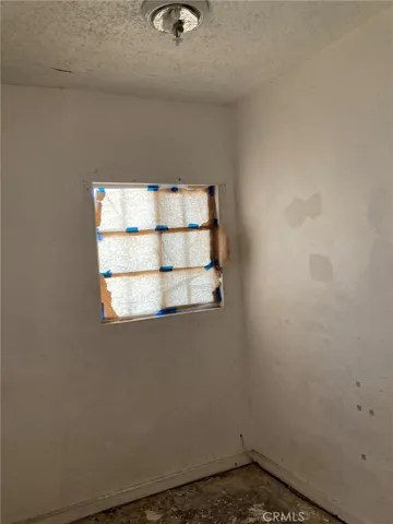 Unit 2 (front unit) - Bonus room off Bdrm 1, other side