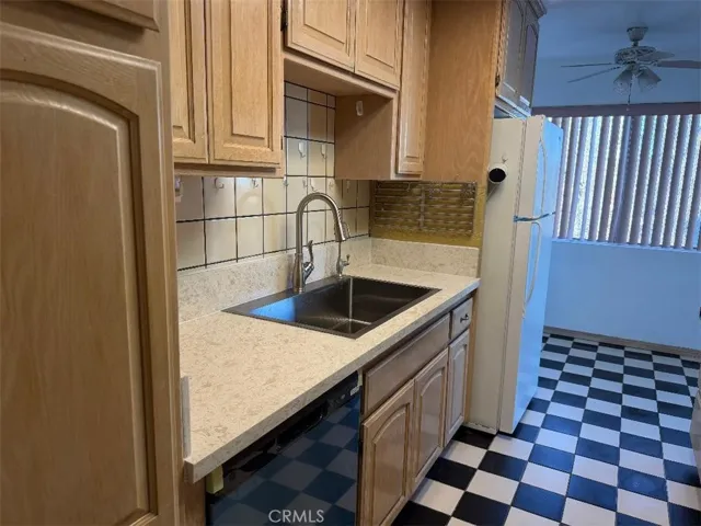 Kitchen with new sink and quartz counter tops