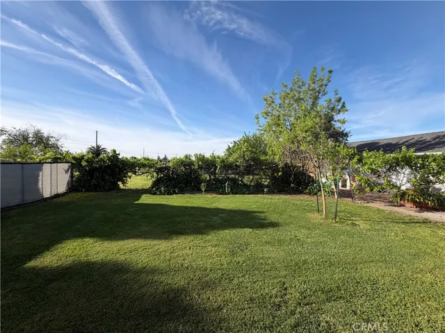 Fenced yard area by house south side