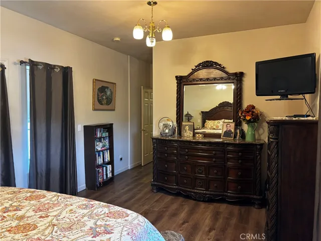 primary walk in closet & bath at entry of bedroom