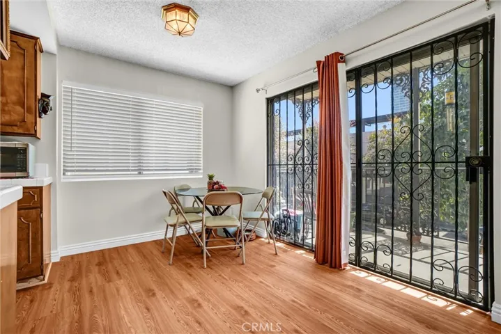 Dining area by Kitchen adjacent Balcony toward Broadway