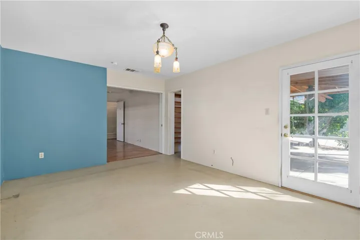 The large closet in the 4th bedroom features custom shelving.