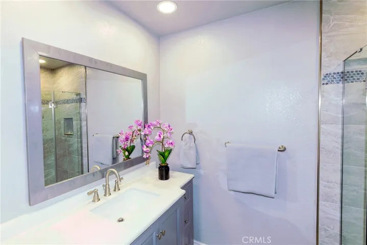 LARGE VANITY IN PRIMARY BATHROOM