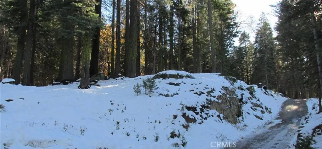 Property is on left; private driveway on right is by western edge of property.  No access available from private driveway.