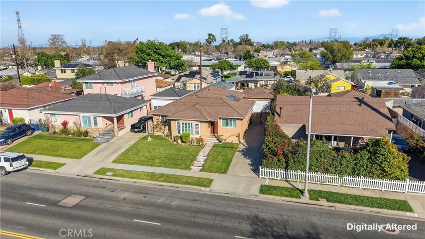 front of property showing other large homes in the area