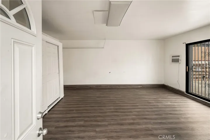 Converted garage has vinyl flooring