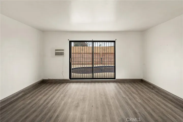 Converted garage with view, wall AC unit and slider to pool
