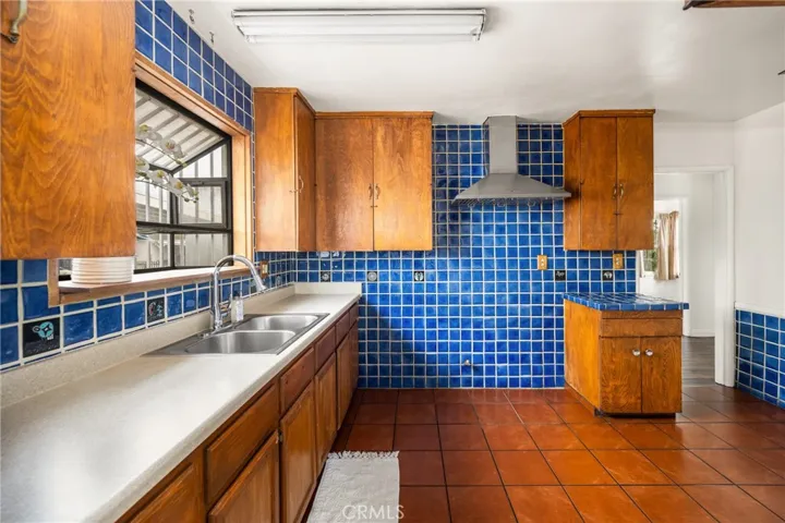 Kitchen with custom tiles