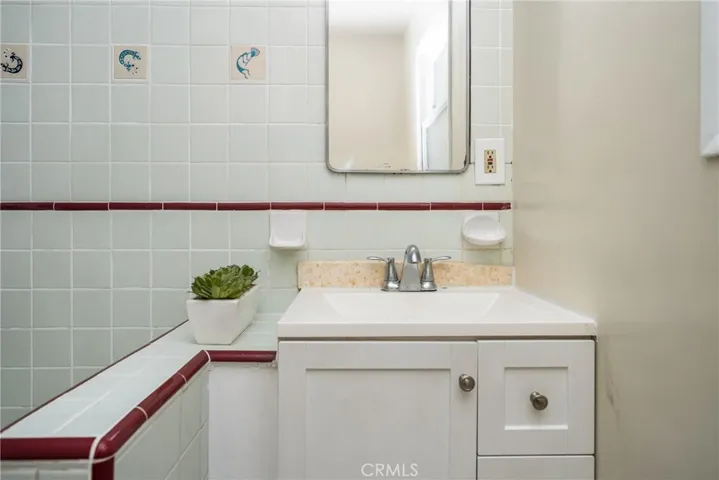 Second bathroom with reglazed tub