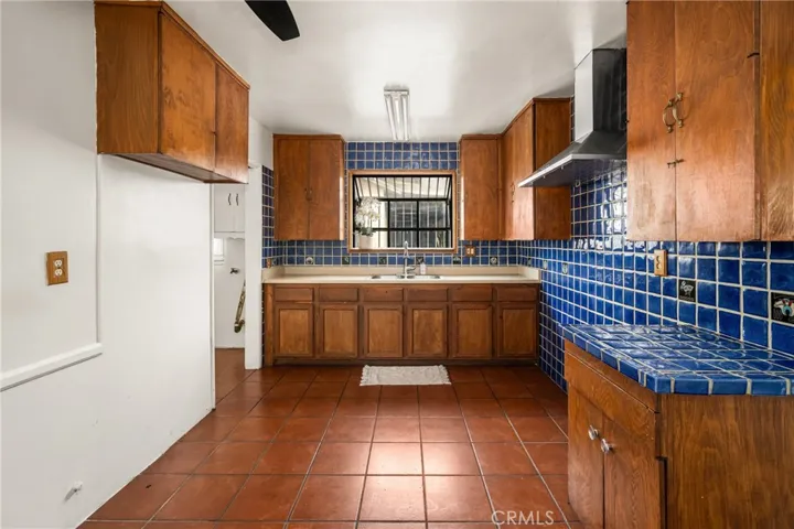 Kitchen with custom tiles