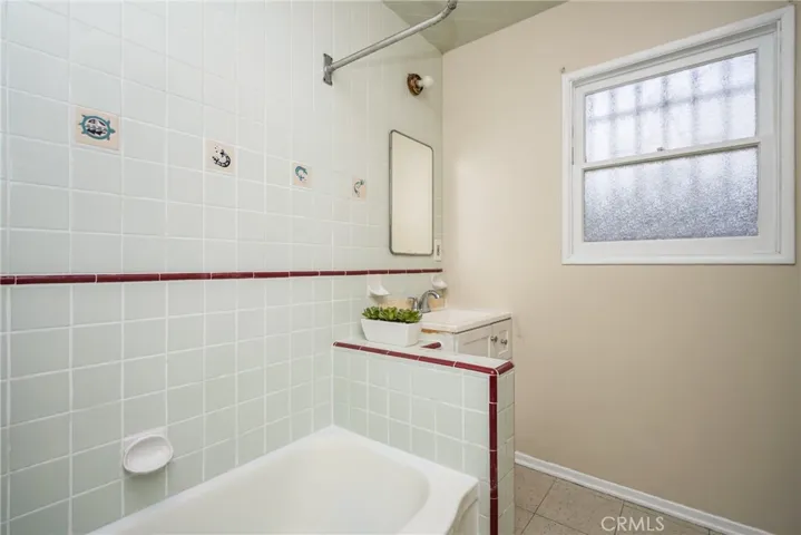 Second bathroom with reglazed tub