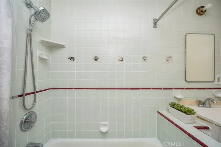 Second bathroom with reglazed tub