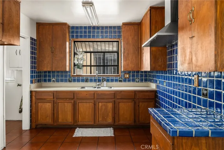 Kitchen with custom tiles