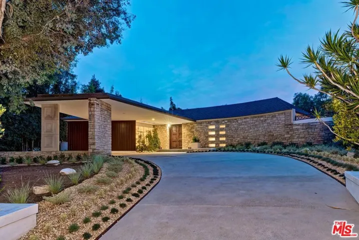 Facade with Sweeping Driveway
