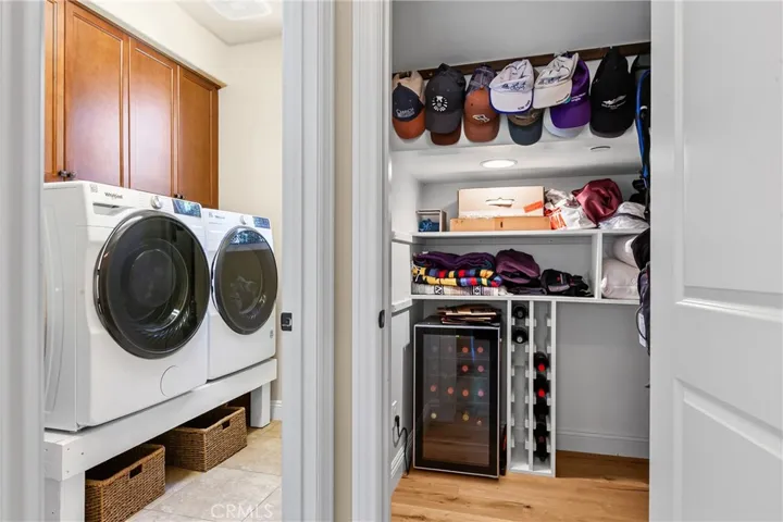 Laundry room and walk in storage closet