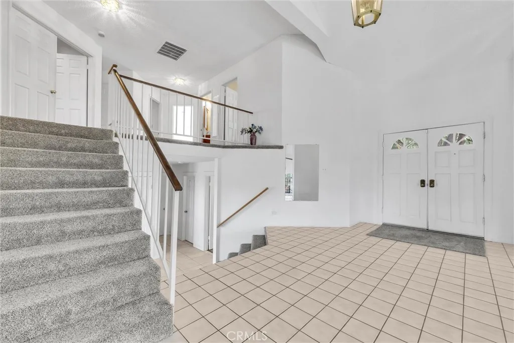 Short stairway to the upper bedrooms.  At entry to the home.