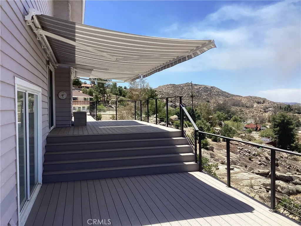 Two Sun Setter awnings with remote control for summer shade.