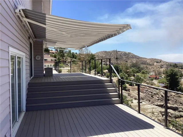 Two Sun Setter awnings with remote control for summer shade.