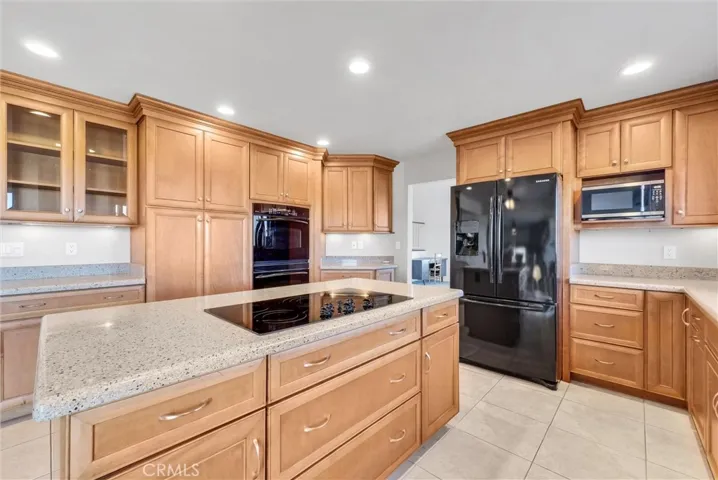 Kitchen with convenient island cook top