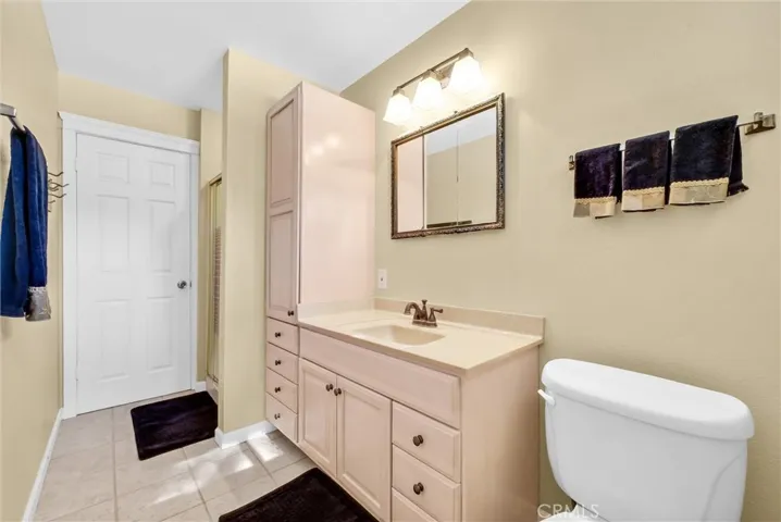 Bathroom one on entry floor adjacent to the office/bedroom.