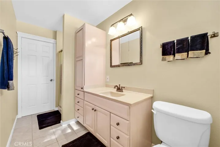 Bathroom one on entry floor adjacent to the office/bedroom.