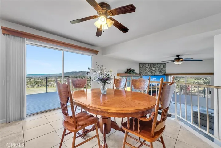 Informal dining off kitchen with great views and slider to the deck.