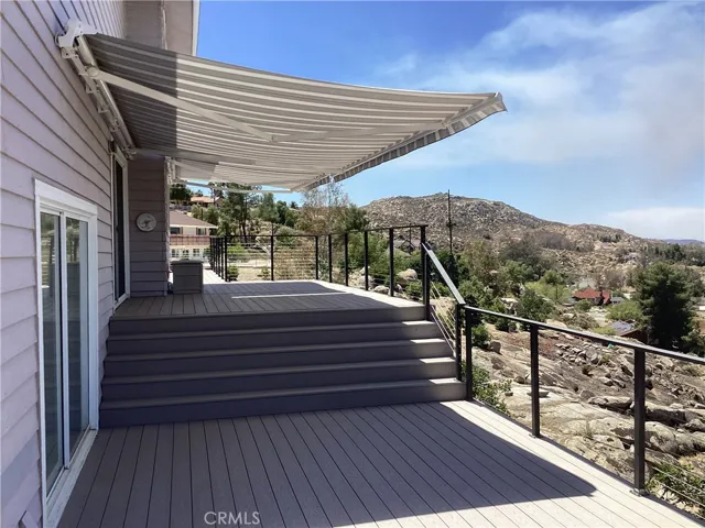 Two Sun Setter awnings with remote control for summer shade.