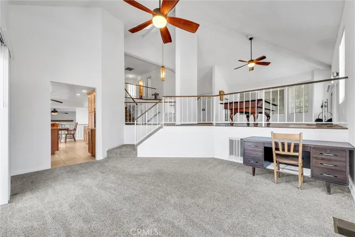 Formal dining area just below the living room/game room.