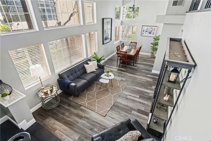 A view from above shows how the open layout connects the living and dining areas seamlessly.