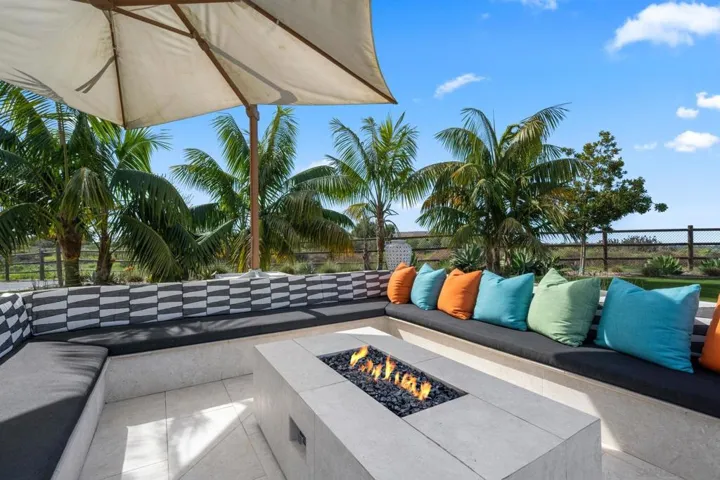 Large, lounging area around built in fire pit. Great place to watch sunsets.