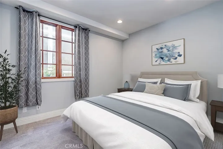 Virtual staging added. Wall hanging virtually removed.