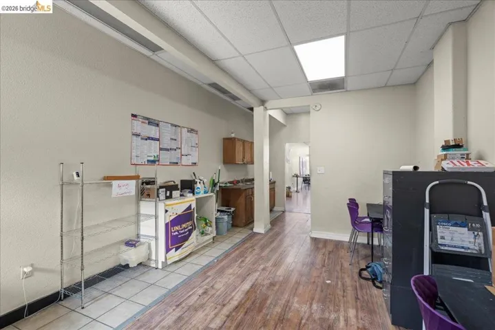 Office area with a paneled ceiling