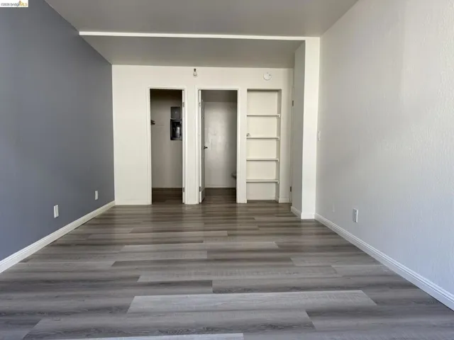 Bedroom #1 featuring wood finished floors