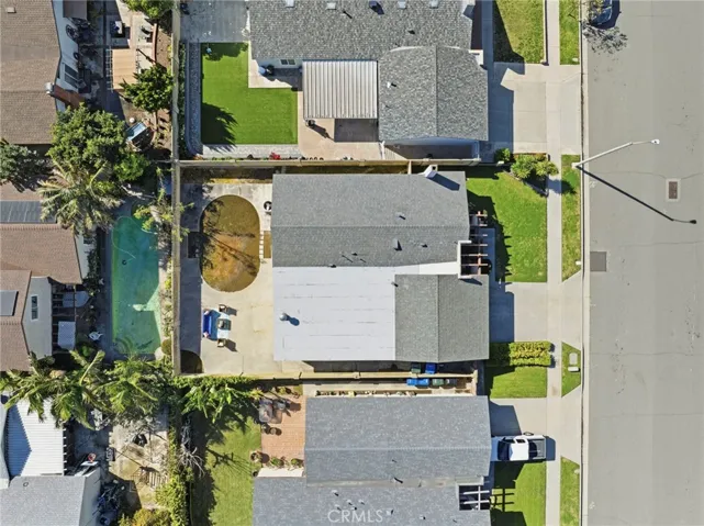 The spacious backyard provides a wonderful setting for relaxing or entertaining guests.