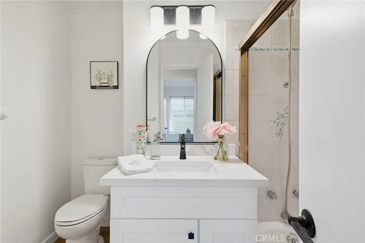 Both bathrooms have been upgraded with new vanity cabinets and modern fixtures, adding a fresh and contemporary feel.