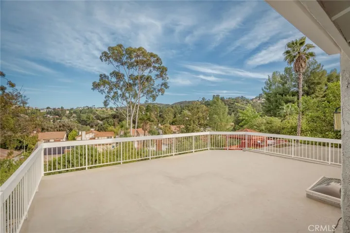 Primary Sun Deck with Spiral Staircase to Backyard