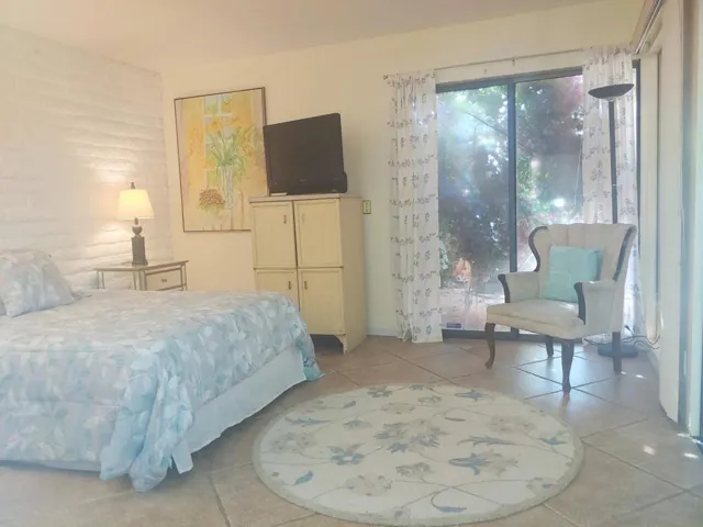 Guest Bedroom Looks Out On Courtyard