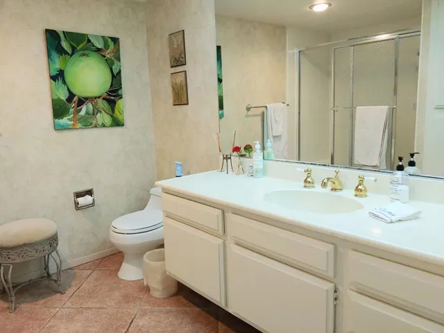 Powder Room has Shower over Tub