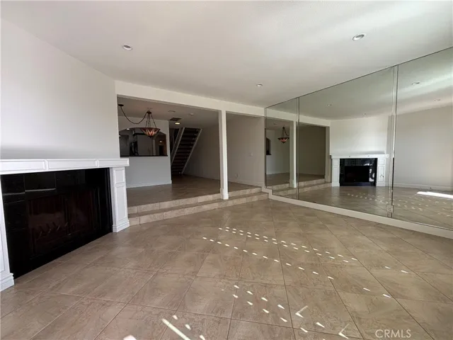 Living room view towards the sliding door access to patio
