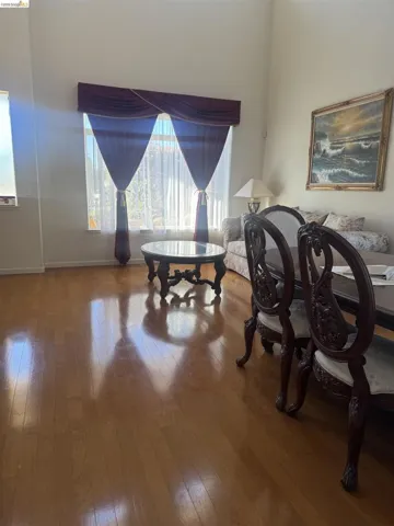 Hardwood-finish flooring throughout the space