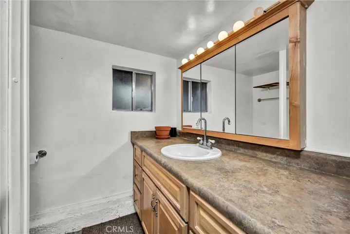 Full bathroom with stall shower downstaris