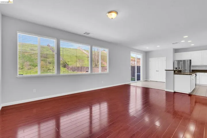 Unfurnished living room featuring recessed lighting and light wood-style flooring