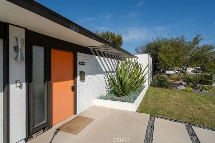The home can be entered thru the direct-access two-car garage, or through the front door that enters the classic open-air foyer.