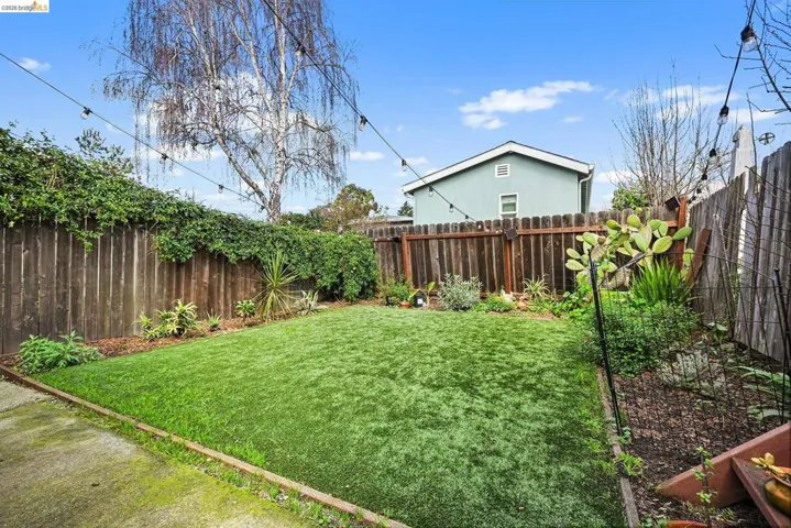 View of fenced backyard